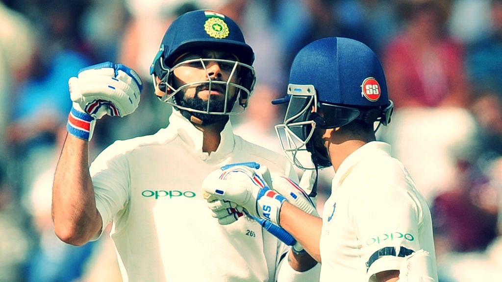  Virat Kohli, left, greets teammate Ajinkya Rahane during Day 1 of the third Test against England.
