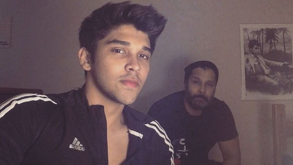 File photo of Dhruv (L) with his father, Tamil superstar Vikram (R).