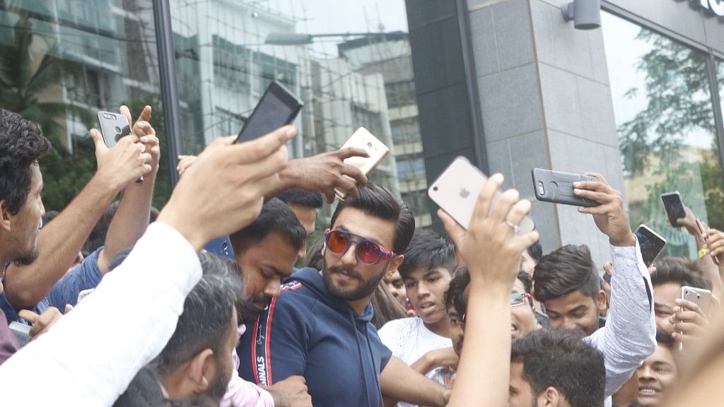 Ranveer Singh gets photos clicked with his fans.