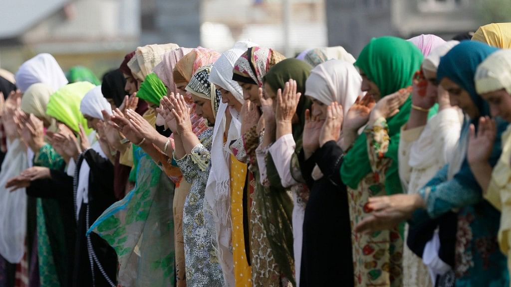 Kashmiri Muslims offer Eid al-Adha prayers in Srinagar.