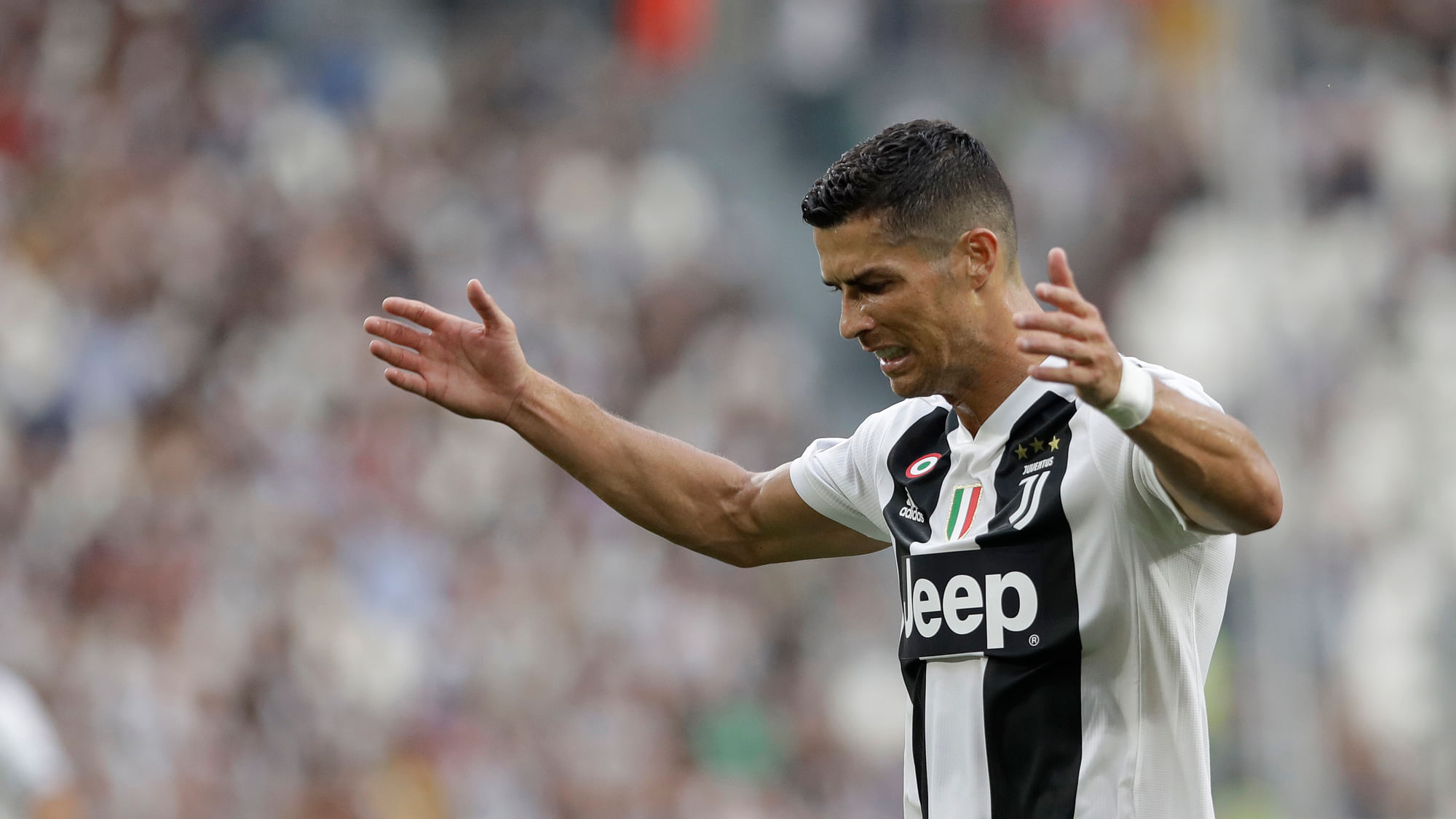 Juventus’ Cristiano Ronaldo reacts after missing a chance on goal during the Serie A soccer match between Juventus and Lazio at the Allianz Stadium in Turin, Italy.