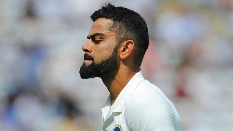 Virat Kohli walks off the ground after being dismissed on Day 4 of the first Test against England.
