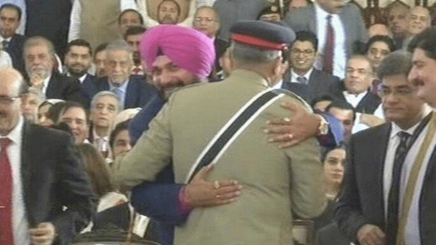 Congress leader Navjot Singh Sidhu hugs Pakistan Army chief General Qamar Javed Bajwa at Imran Khan’s swearing-in ceremony.
