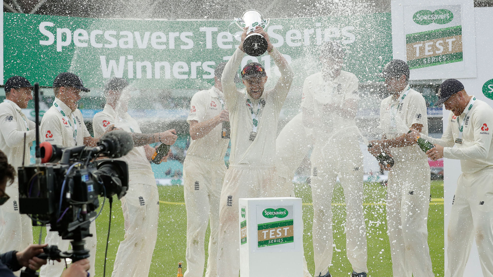 England captain Joe Root raises the series trophy at end the fifth cricket test match of a five match series between England and India at the Oval cricket ground in London, Tuesday, Sept. 11, 2018.&nbsp;