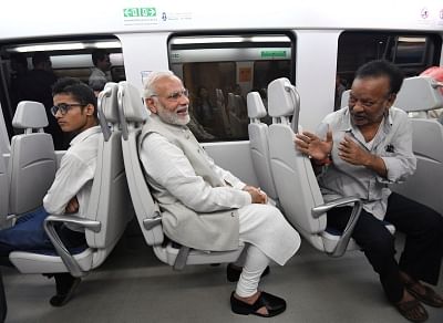 New Delhi: Prime Minister Narendra Modi travels in Airport Express Line of the Delhi metro to reach the venue of foundation stone laying ceremony of India International Convention and Expo Centre at Dwarka, in New Delhi on Sept 20, 2018.