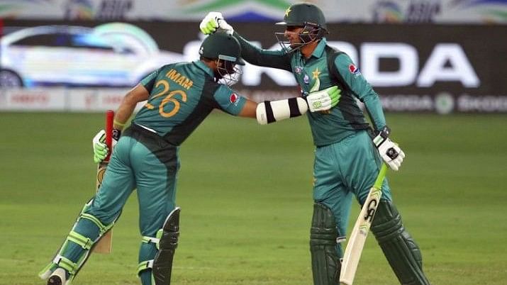 Shoaib Malik (left) and Imam-ul-Haq in action against Afghanistan in the Asia Cup on Friday.