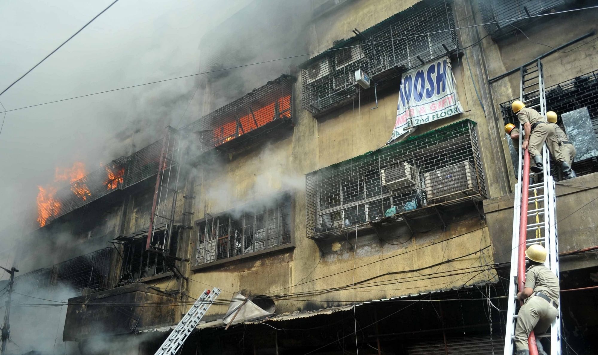 Fire fighters busy dousing the massive fire at Bagri Market, a wholesale market in Kolkata.