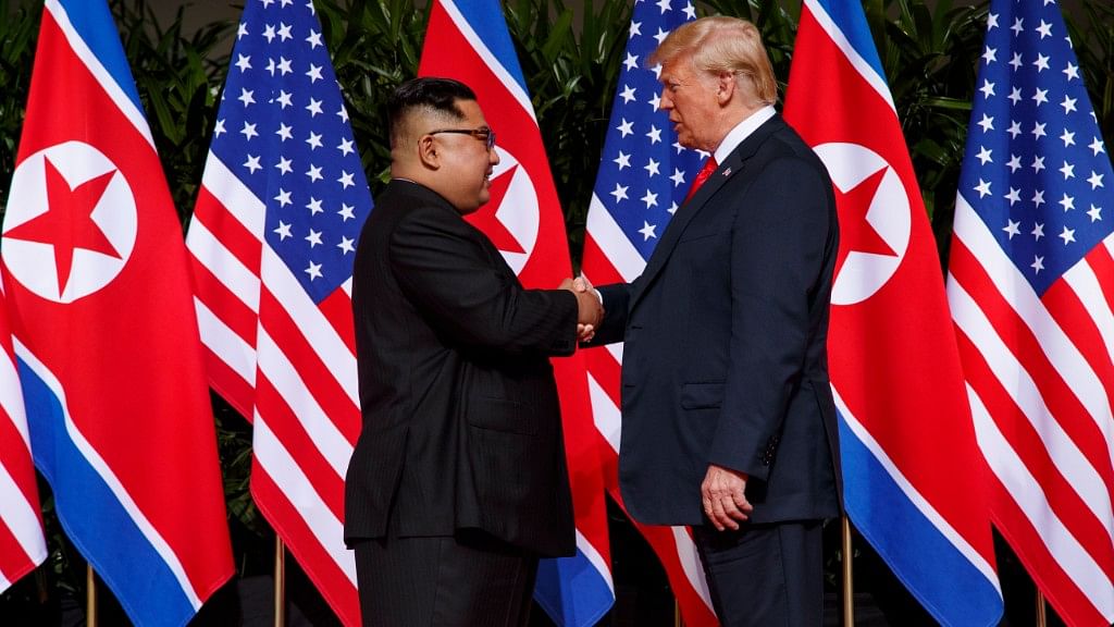 President Donald Trump meets with North Korean leader Kim Jong Un on Sentosa Island in Singapore during their first summit.