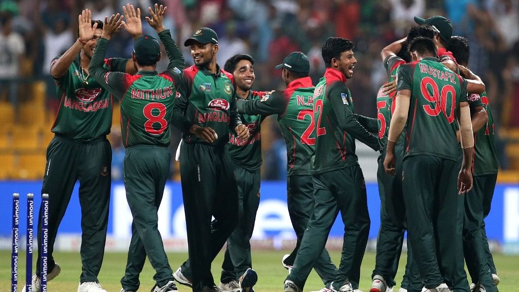Bangladesh players celebrate their win over Pakistan in the one day international cricket match of Asia Cup in Abu Dhabi.