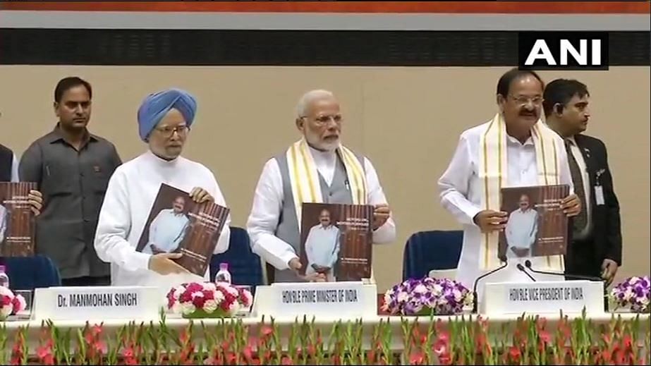Former PM Manmohan Singh, PM Modi and Vice-President M Venkaiah Naidu at the book launch.&nbsp;