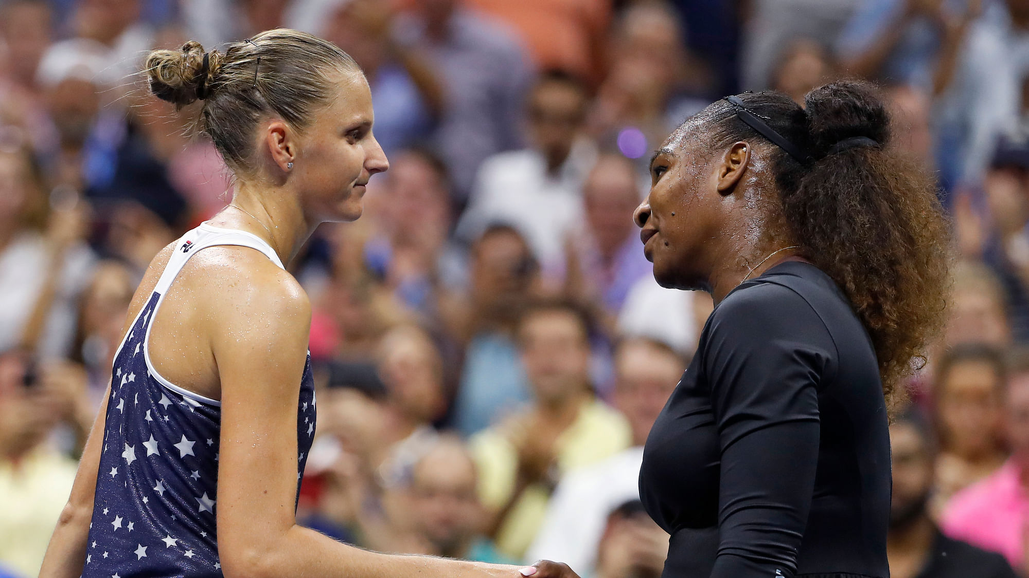 Serena Williams, right, of the United States, shakes hands with Karolina Pliskova, of the Czech Republic, after Williams’ 6-4, 6-3 win during the quarterfinals of the U.S. Open tennis tournament Tuesday, Sept. 4, 2018, in New York