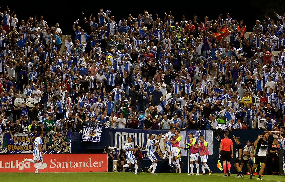 Leganes’ players celebrate after scoring their second side’s goal during the Spanish La Liga soccer match between Leganes and FC Barcelona at the Butarque stadium in Leganes, Spain, Wednesday, Sept. 26, 2018. 