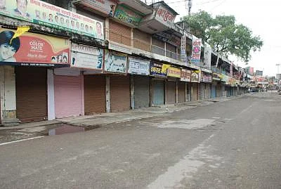 Deserted roads at Muzaffarnagar as Army petrol the streets to defuse tension on Sept 9, 2013. (Photo: IANS)