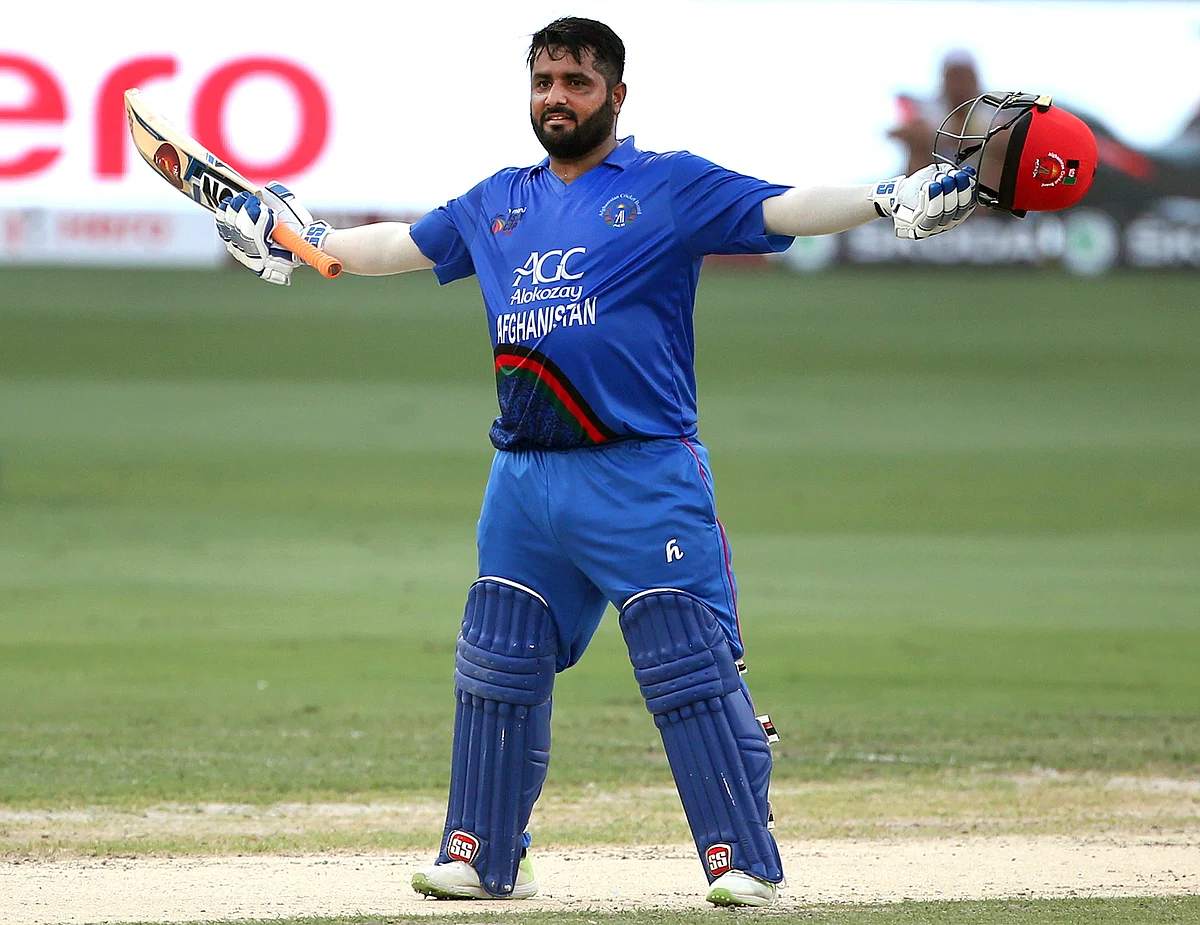 Mohammad Shahzad celebrates after scoring a century. 