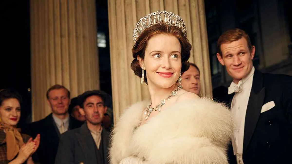 Claire Foy as Queen Elizabeth and Matt Smith (right) as Philip, Duke of Edinburgh in a still from <i>The Crown</i>.