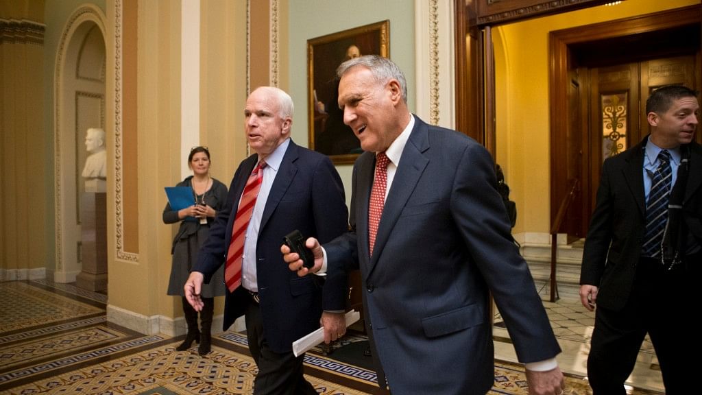 File photo of Jon Kyl with John McCain.