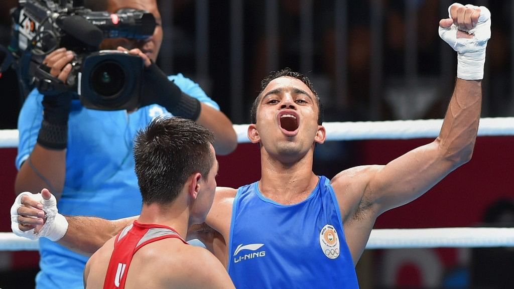 Amit beat Uzbekistan’s Dusmatov 3-2 in the final of the Men’s 49 kg category in boxing. 
