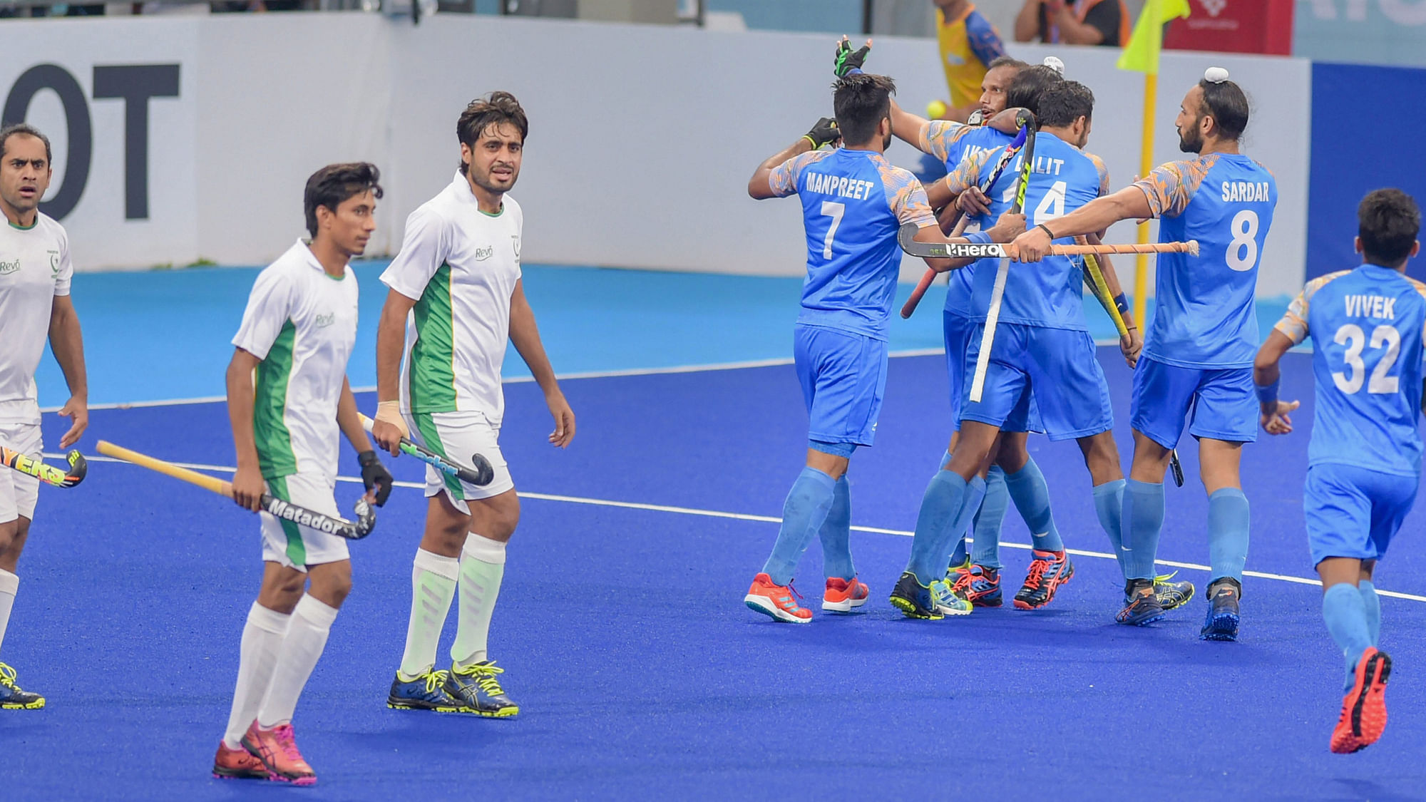 Akashdeep Singh celebrates with teammates after scoring their first goal against Pakistan during the India vs Pakistan bronze medal at the 2018 Asian Games.