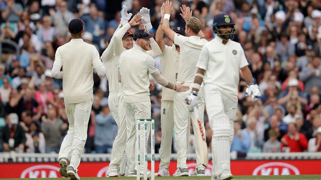 England’s Stuart Broad celebrates after taking the wicket of India’s Shikhar Dhawan at the Oval in London on Saturday.