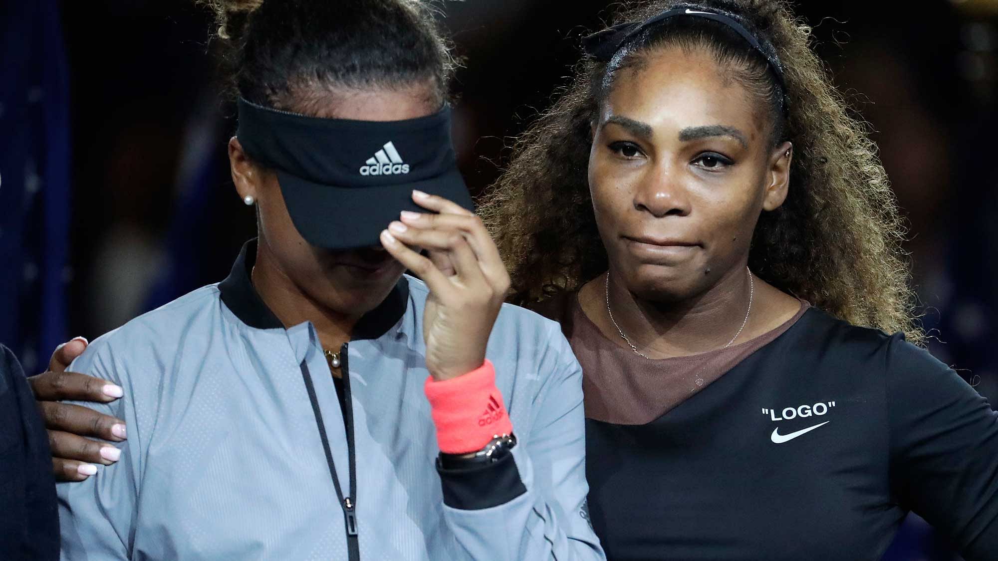 Serena Williams comforts Naomi Osaka whent the audience starts booing during the presentation ceremony of the 2018 US Open women’s final.