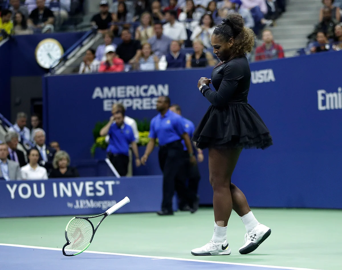 Serena Williams slams her racket on the court during the women’s final of the US Open.