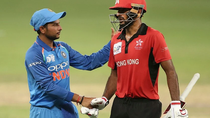 India’s Kuldeep Yadav congratulating Hong Kong’s Nizakat Khan after he got dismissed for 92.
