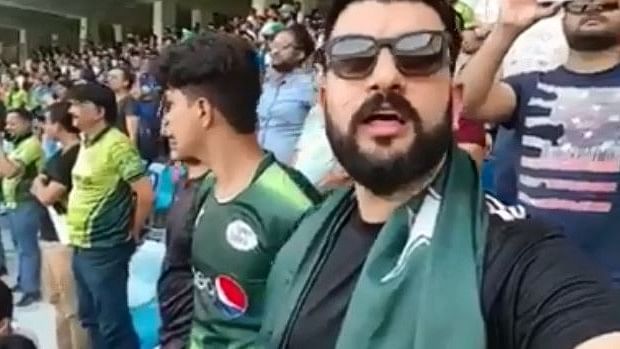 A Pakistani cricket fan is seen singing the Indian national anthem.&nbsp;