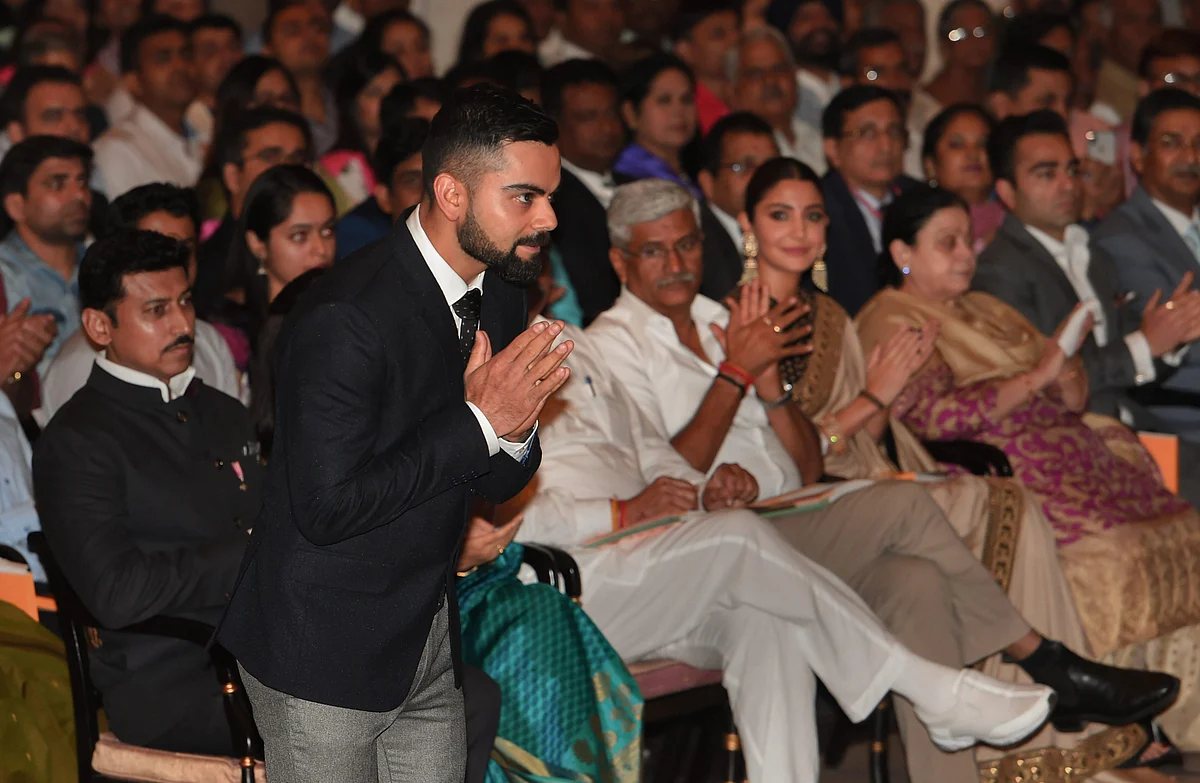 Indian cricket captain Virat Kohli before receiving the Rajiv Gandhi Khel Ratna award at the National Sports and Adventure Award 2018 function at Rashtrapati Bhawan in New Delhi, Tuesday, Sep 25, 2018. 