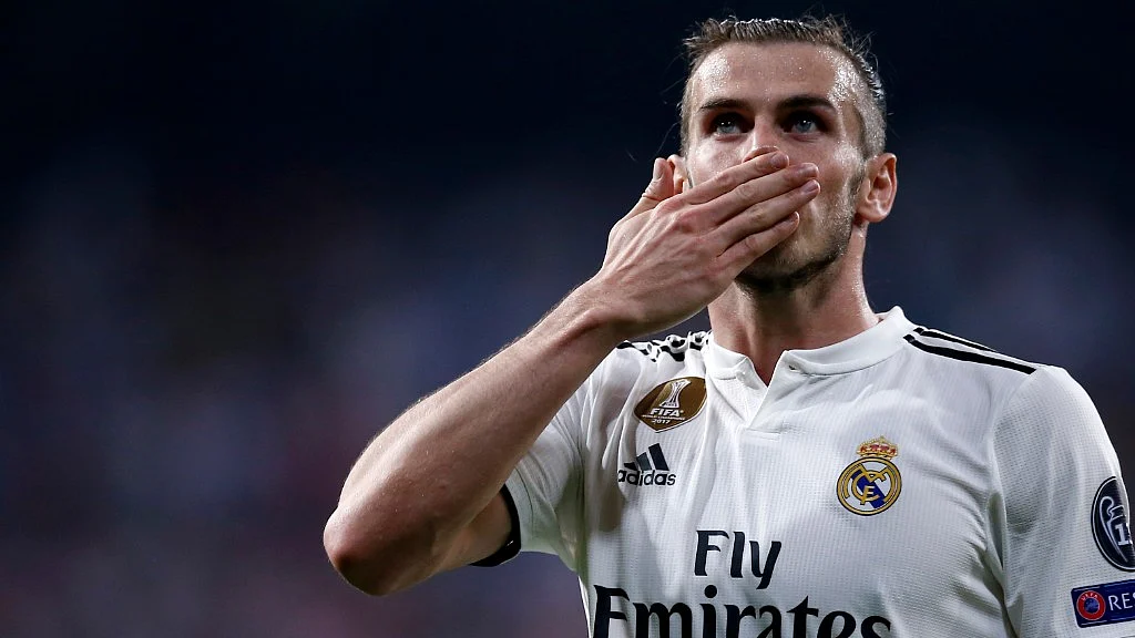 Real midfielder Gareth Bale celebrates after scoring his side’s second goal during their Champions League match against Roma in Madrid on Wednesday.