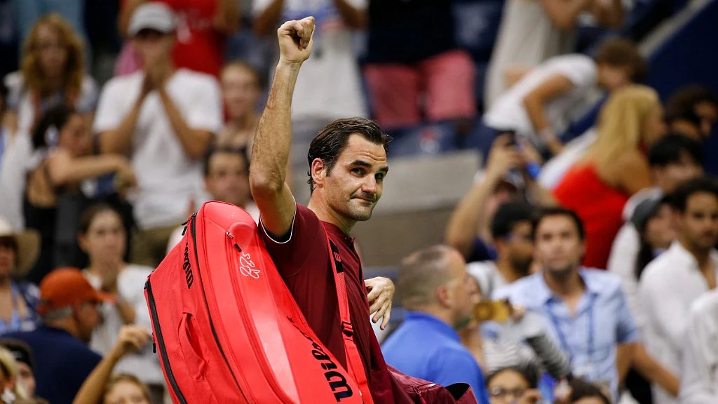 Roger Federer bids the crowd goodbye after his exit at the US Open.