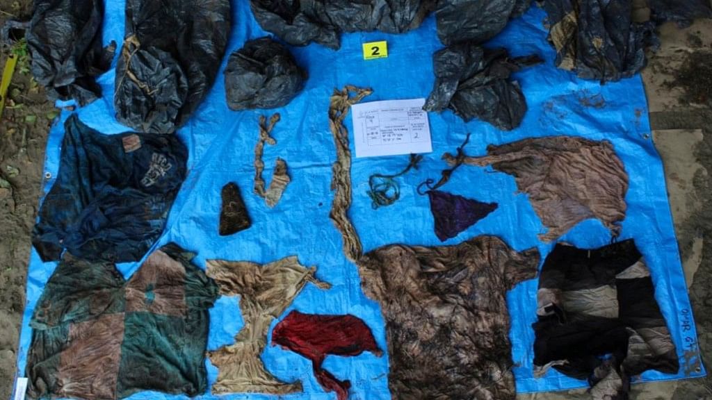 Clothing items found at the site of a clandestine burial pit in the Gulf coast state of Veracruz, Mexico.