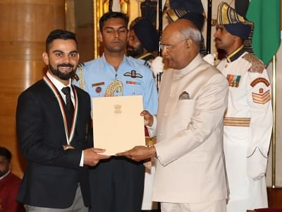 New Delhi: President Ram Nath Kovind confers the Rajiv Gandhi Khel Ratna Award 2018 upon Indian cricketer Virat Kohli in recognition of his outstanding achievements in cricket during National Sports Awards Ceremony at the Rashtrapati Bhawan in New Delhi on Sept 25, 2018. (Photo: Amlan Paliwal/IANS)