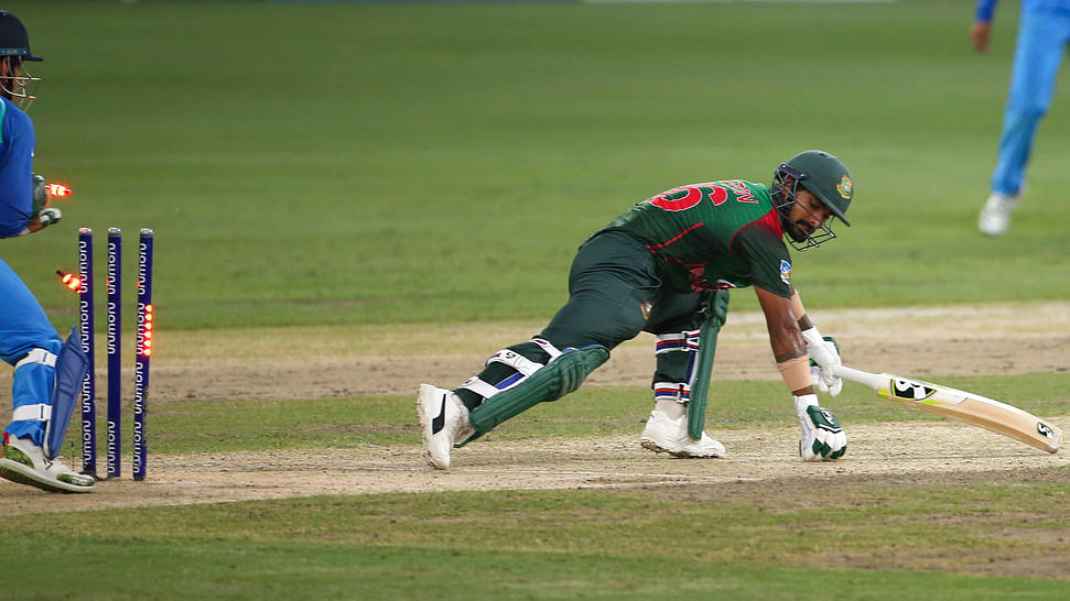 Bangladesh’s Liton Das getting stumped by India’s Mahendra Singh Dhoni in the Asia Cup final on Friday.&nbsp;