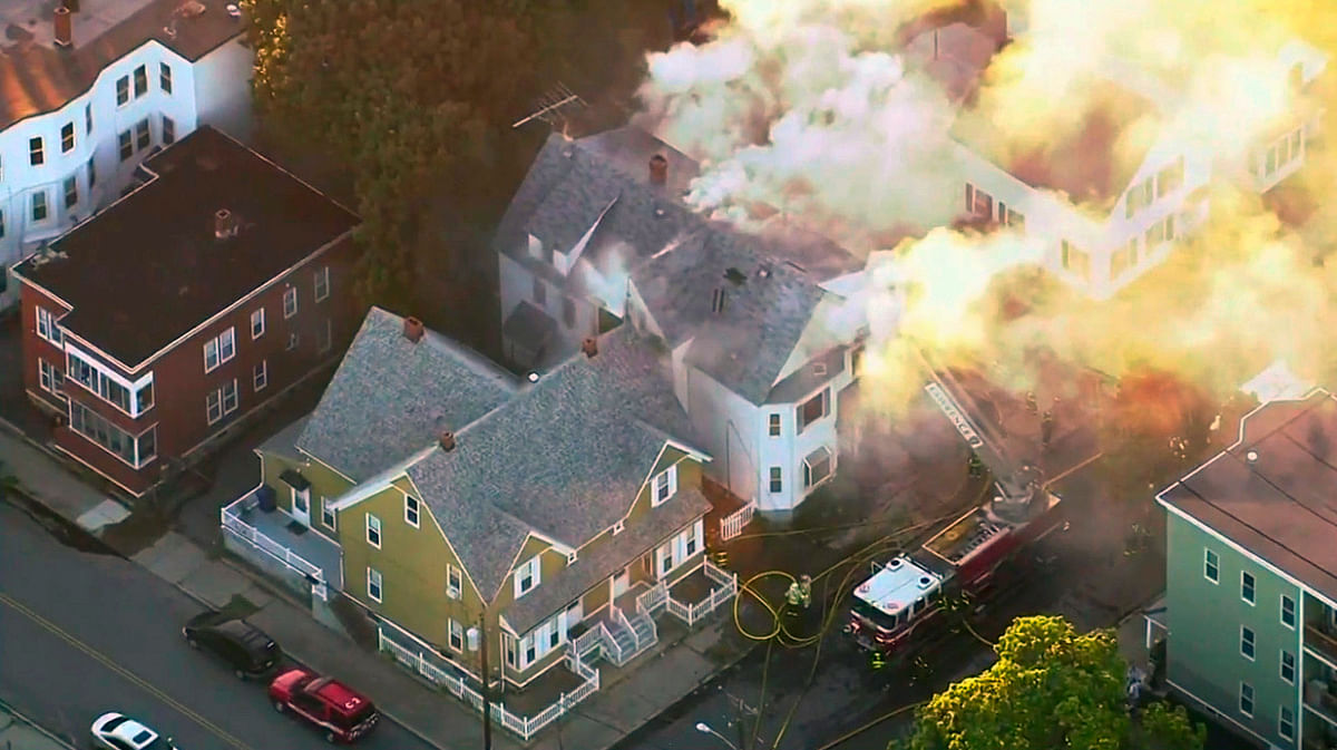 A series of gas explosions set fire to 39 houses and injured at least six people.