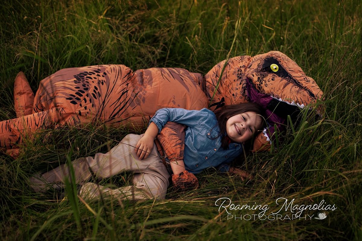 Eight-year-old Levi hated getting his pictures clicked, but a T-Rex costume helped him out.