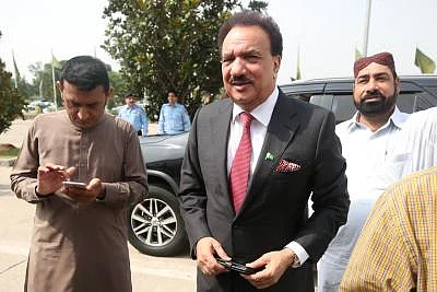 ISLAMABAD, Sept. 4, 2018 (Xinhua) -- Former interior minister Rehman Malik (front) arrives to cast his vote at the National Assembly during the presidential election in Islamabad, capital of Pakistan on Sept. 4, 2018. Polling for presidential election kicked off Tuesday in Pakistan with three candidates competing for the slot of the 13th president of the country for the next five-year term. (Xinhua/Ahmad Kamal/IANS)