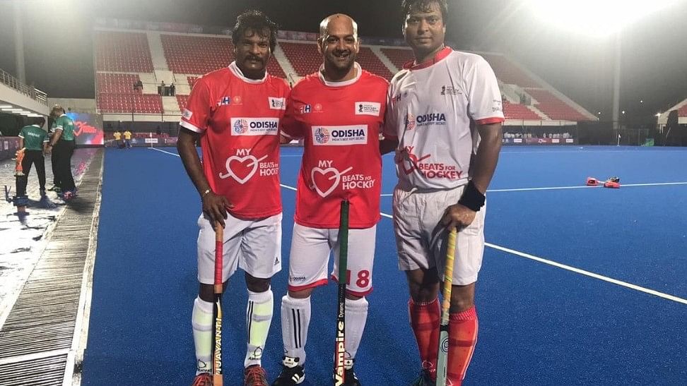 Former Indian hockey skipper Dilip Tirkey (right) and Dhanraj Pillay (left) during an exhibition match at the inauguration of refurbished Kalinga Stadium.