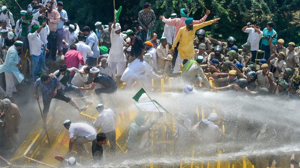 Police used water cannons to disperse farmers protesting at Delhi-UP border during ‘Kisan Kranti Padyatra’.