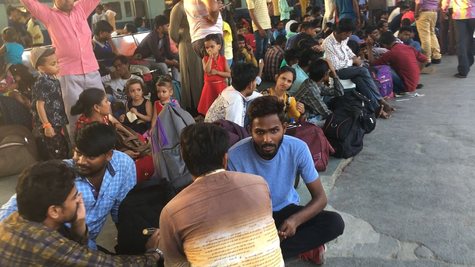 Migrant Labourers and their families flock to Ahmedabad Railway Station to escape violence in the aftermath of a 14-month-old minor girl’s rape in Sabarkantha District.