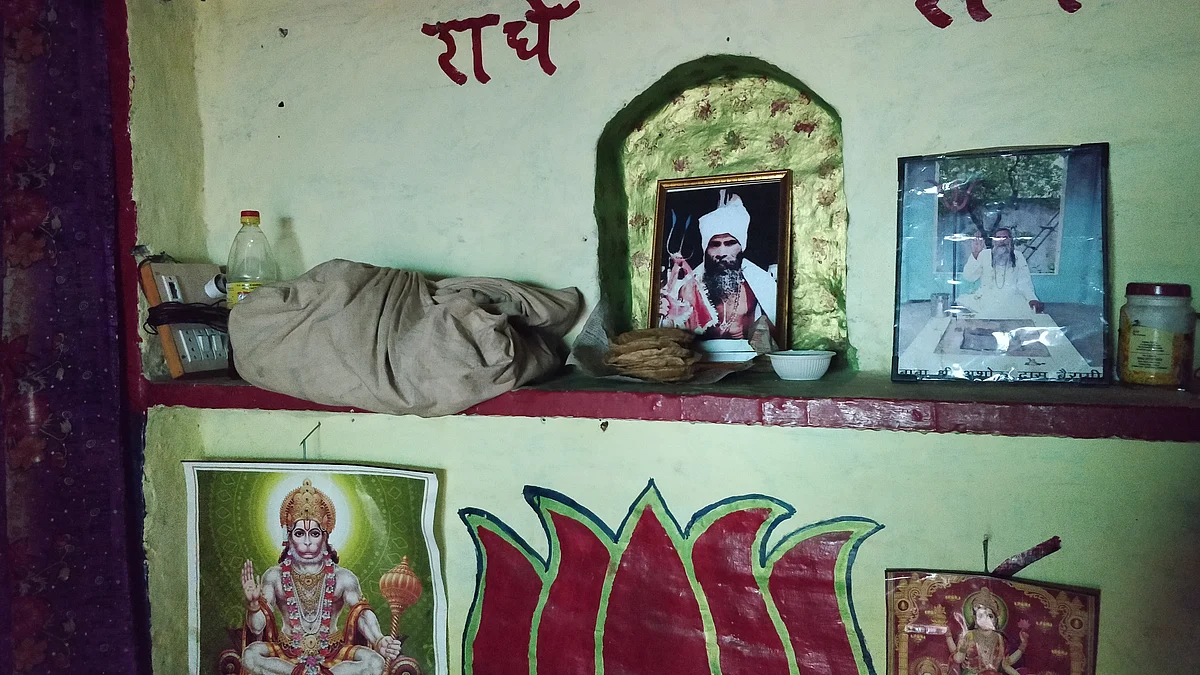 A photo of Roop Singh inside his house. 