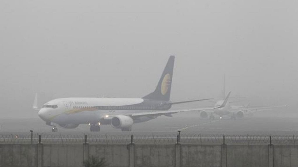 File image of a flight at Delhi airport during fog.&nbsp;