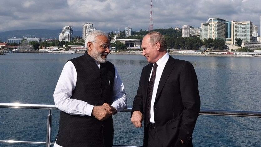 Russian President Vladimir Putin and Prime Minister Narendra Modi on a Yacht in Sochi, Russia on 21 May.