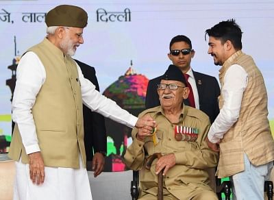 New Delhi: Prime Minister Narendra Modi honours the veterans of the Azad Hind Government at the NationalFlag hoisting ceremony to commemorate the 75th anniversary formation of the Azad Hind Government, at Red Fort inDelhi on Oct 21, 2018. (Photo: IANS/PIB)