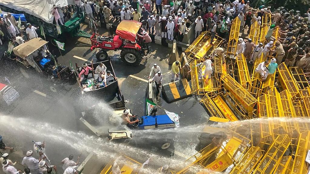 Thousands of protesting farmers were stopped at the Delhi-UP border on 2 October, with the police using water cannons and tear gas shells to disperse them.