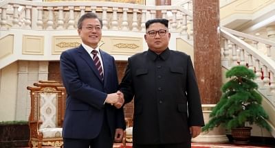 South Korean President Moon Jae-in (L) and North Korean leader Kim Jong-un. (Yonhap/IANS)