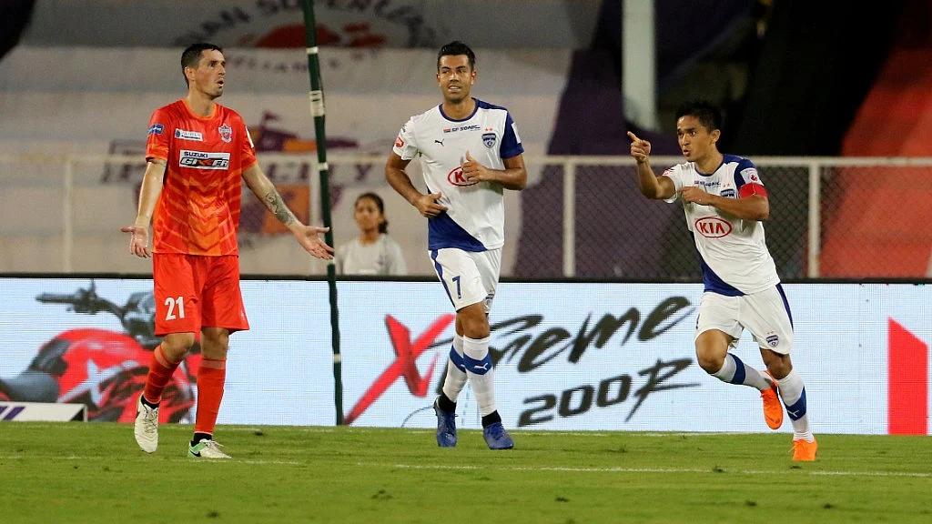 Sunil Chhetri of Bengaluru FC celebrates two successive goals with teammates against FC Pune City on Monday.