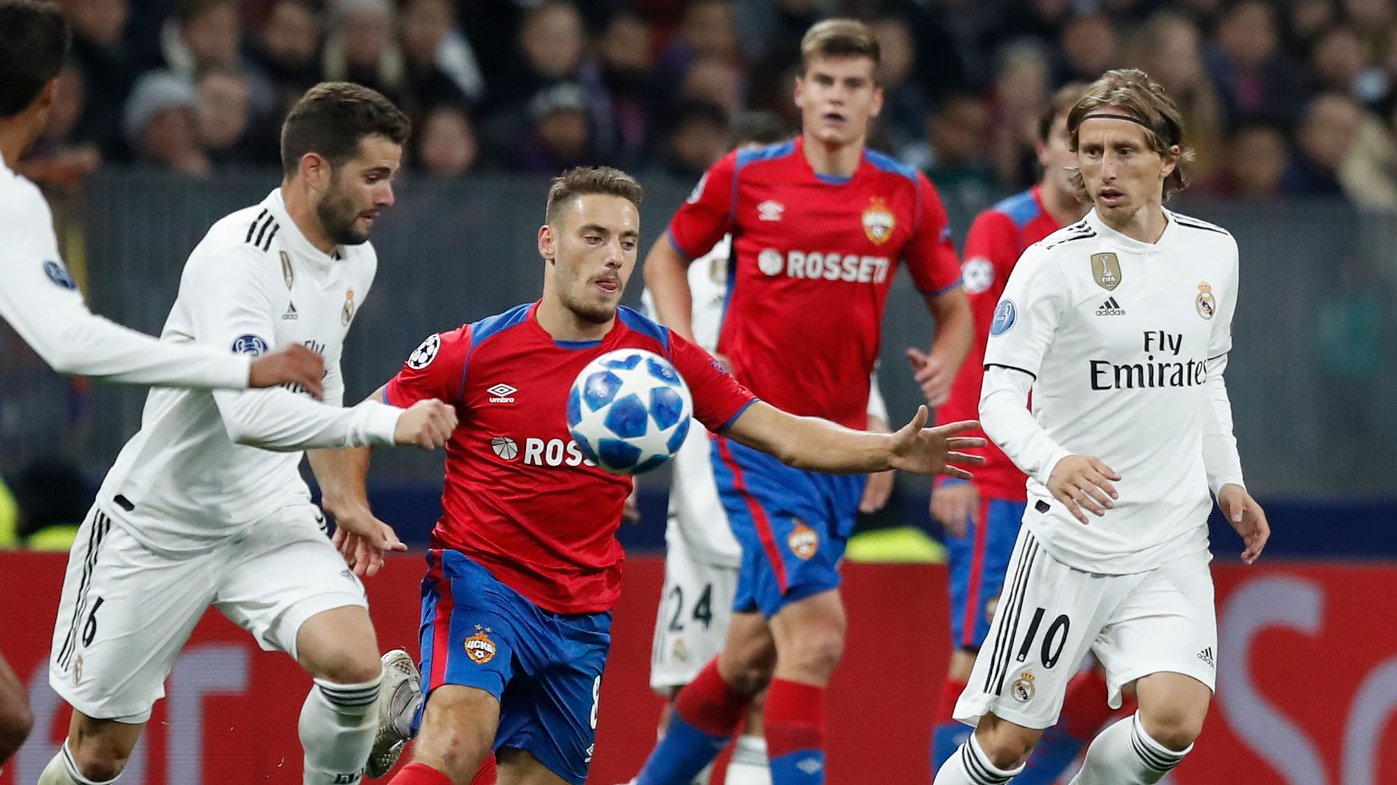 CSKA midfielder Nikola Vlasic, center, challenge for the ball with Real midfielder Luka Modric, right, and Real defender Nacho Fernandez during a Group G Champions League soccer match.&nbsp;