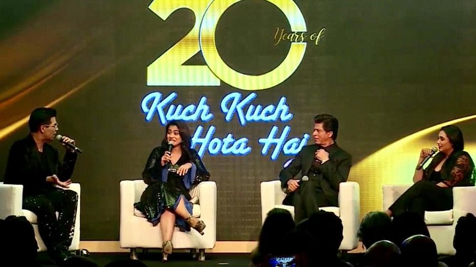 Karan Johar, Kajol, Shah Rukh Khan and Rani Mukerji at the celebration.