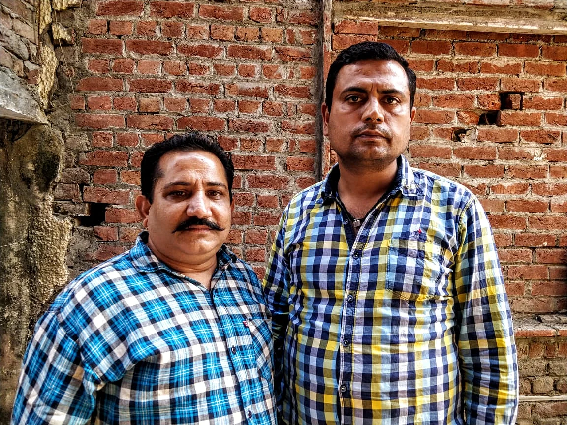 Kuldeep Singh (left) and Vishal Anand are neighbours. Theirs is the lane where the man who played Ravana in the Ramleela, Dalbir, was killed.