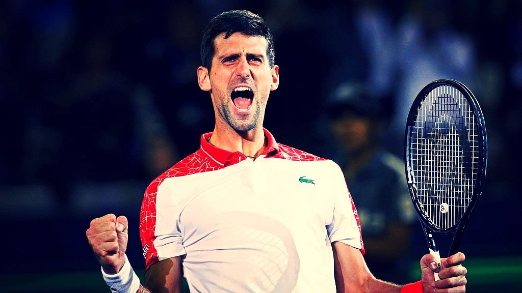 Novak Djokovic of Serbia celebrates after defeating Borna Coric of Croatia in their singles final match in the Shanghai Masters.